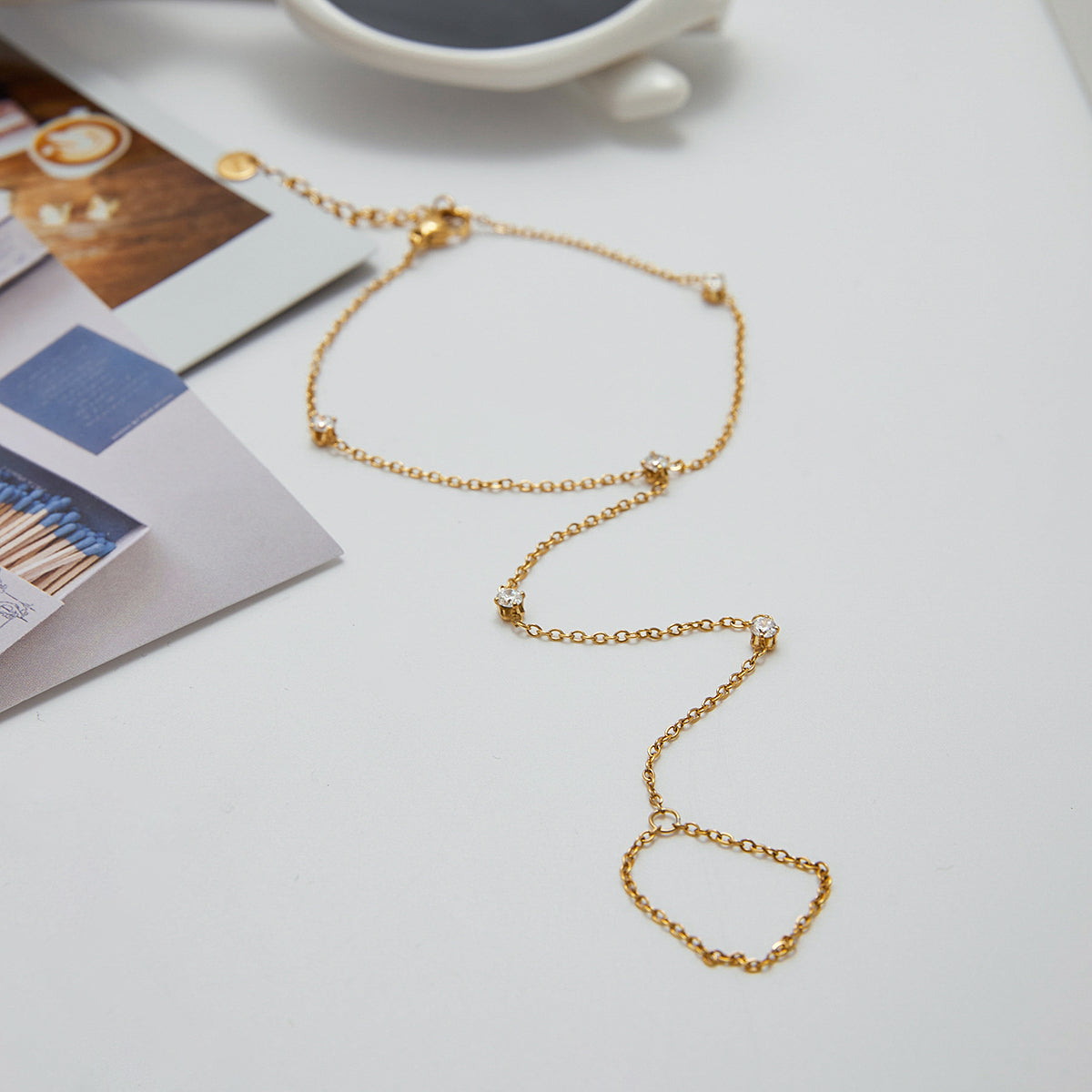 ZIRKONIA HANDKETTE ARMBAND | VERGOLDET